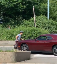 The driver trying to kill the biker. Photo: Barstool Sports.