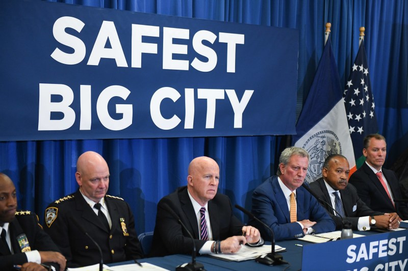 Mayor de Blasio (with Police Commissioner O'Neill to his right) says he is sympathetic towards e-bike delivery workers. Photo: Michael Appleton/Mayoral Photography Office