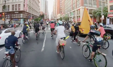 Riders took over Sixth Avenue to demand safety for cyclists at the Critical Mass ride on Friday, July 26, 2019. Photo: Michael Kaess
