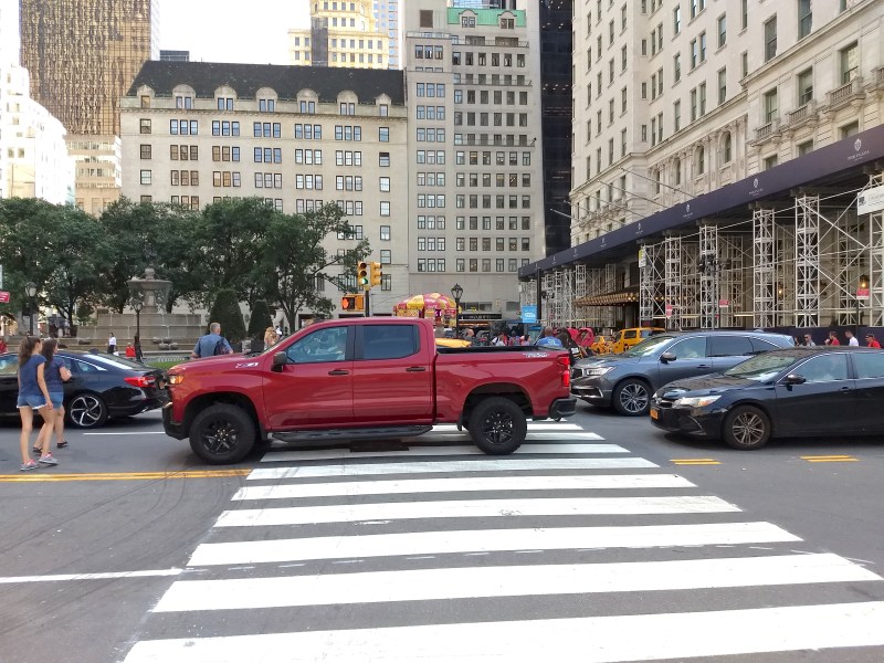 A pedestrian/traffic mashup near the Plaza Hotel at Fifth Avenue and 59th Street shows just how dangerous it is on one of New York's grandest thoroughfares. Photo: Liam Jeffries