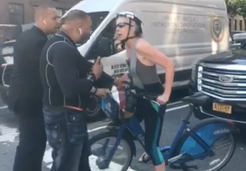 Two large men physically intimidated a woman on a Citi Bike and prevented her from leaving because they said she scratched their car.