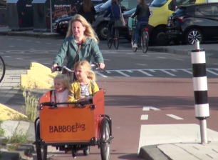 Riding a cargo bike with kids in Amsterdam. How can we make it convenient and common in NYC? Photo: Clarence Eckerson Jr.