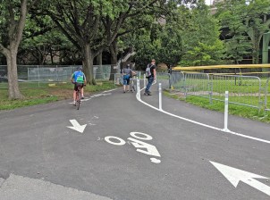 The current "shared path" is too narrow, too steep and doesn't really keep pedestrians and cyclists apart — which was the whole point of diverting cyclists from the Hudson River Greenway between 72nd and 83rd streets. Photo: Streetsblog