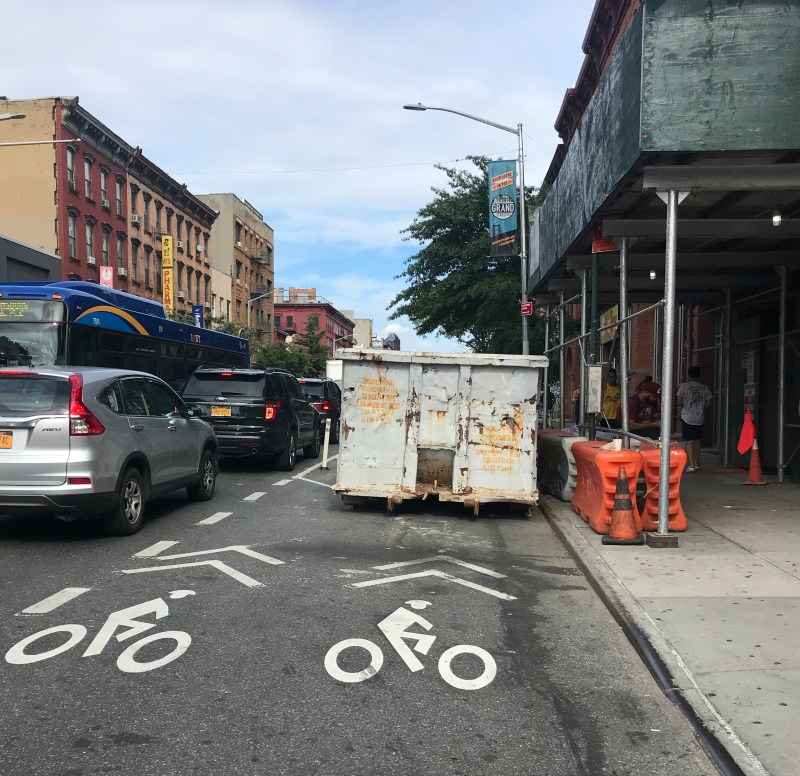 A dumpster in the bike lane. Photo: Julianne Cuba.
