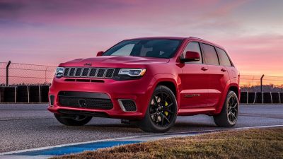 Red like the devil: A motorist used a Jeep Grand Cherokee (like the one above) to run down a cyclist he suspected of breaking into the car.