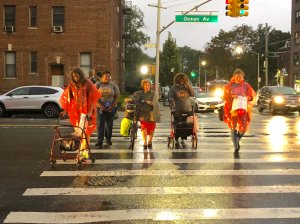Another week, another rally against the blood tide. Marchers crossed Ocean Avenue last night during a vigil for a child killed by a driver in Midwood. Photo: Chris Polansky