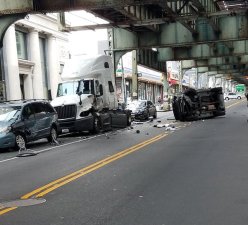 The aftermath of Monday's crash in Bushwick, in which a driver ran over a cyclist and then flipped his Jeep. Photo by ElJayGee3