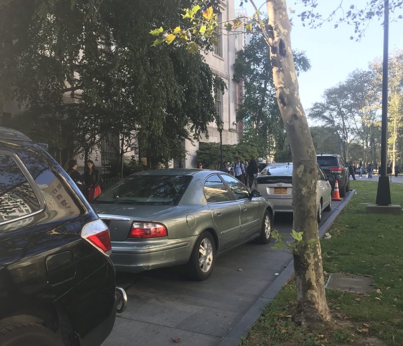 Pols may no longer park their cars on the Brooklyn Borough Hall plaza, as these cars were in 2019. A new movement aims to defeat the Brooklyn machine and the car culture it fosters. Photo: Julianne Cuba