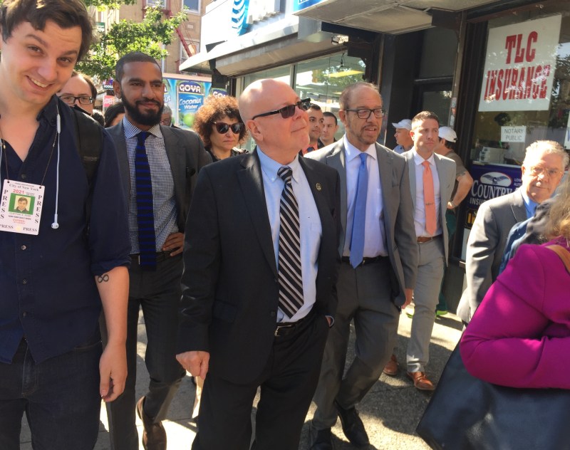 That's the Daily News's Clayton Guse in the far left corner of this photo (on the beat with Queens Supreme Court Justice Joseph Esposito in the center). Photo: Gersh Kuntzman