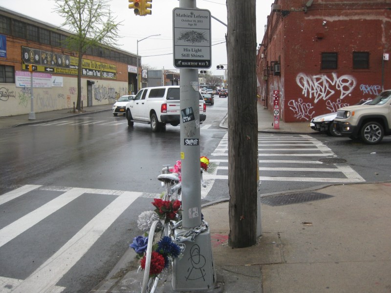 The ghost bike and now-missing tribute sign for Mathieu Lefevre. Photo provided by Erika Lefevre.