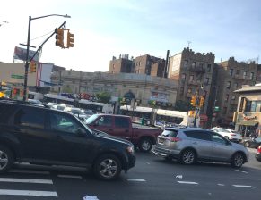 Fordham Road looking west from the southeast corner of Webster Avenue. The packed road and bollixed buses are typical of the morning, evening and midday rush. File photo: Eve Kessler