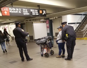 Cops busting a churro vendor at a Brooklyn subway station in 2019. Riders Alliance wants subway security to focus on major crimes and not minor offenses. Photo: Rafael Martinez