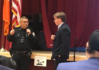 Assembly Member Robert Carroll and a police officer from the 66th Precinct at Monday night's street safety town hall. Photo: Katherine Willis