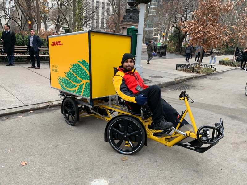 Jose Polanco, a field service supervisor for DHL, shows off his company's version of the cargo bike. Photo: Gersh Kuntzman