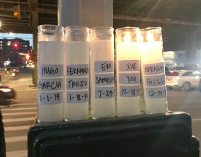 Last year, candles burned for each of the five people killed this year in Sunset Park. File photo: Julianne Cuba