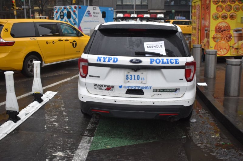 This cop left his or her squad car parked in the bike lane in Columbus Circle — and was more than mildly criticized. Photo: Rich Mintz