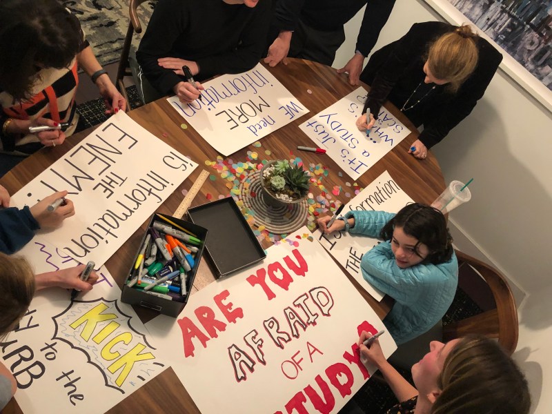 Supporters of the CB7 resolution made posters over the weekend. Photo: Lisa Orman