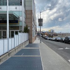 Queens Community Board 7 honchos want to reduce some of this already narrow sidewalk to make room for a turning lane. Photo: Joby Jacob