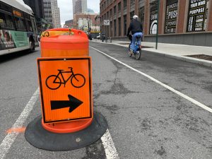 The temporary bike lane on Smith Street in Downtown Brooklyn. The city will double the number of temporary bike lanes it has erected in response to the pandemic, adding nine miles in Manhattan and Queens. Photo: Gersh Kuntzman