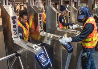 Scrub-a-dub-dub: Transit workers sanitize a New York City subway station. Photo: Patrick Cashin/MTA