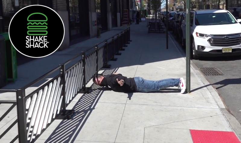 The 5-foot-8 Doug Gordon shows just how little room Shake Shack has left its Tribeca neighbors. Photo: Clarence Eckerson Jr.
