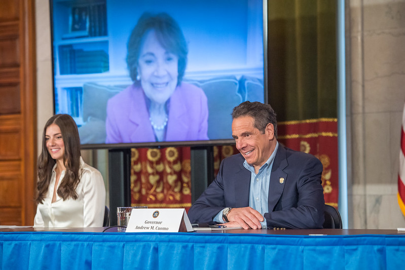 The governor on Sunday with his daughter, Michaela, and his mom Matilda (on screen). Photo: Darren McGee/Governor's office