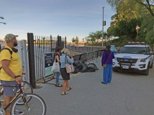 Looking south, the NYPD had put barricades inside Carl Schurtz Park, confusing pedestrians and riders who had just exited the ferry and wanted to walk south. Photo: Steven Vago