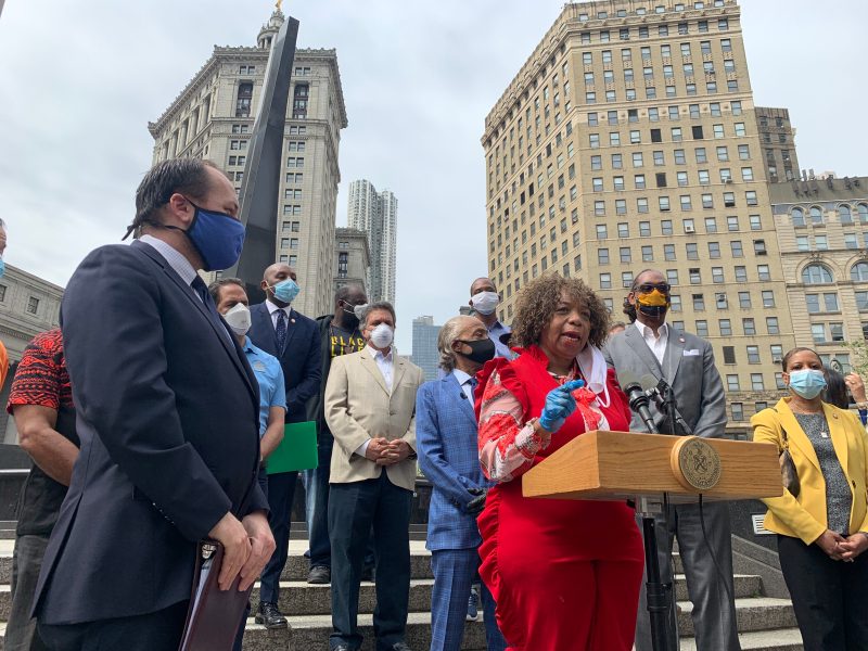 Here was Council Speaker Corey Johnson when he stood with Gwen Carr, the mom of Eric Garner, and supported her call for massive cuts to the NYPD. As it turned out, he didn't fight as hard as he said he would. File photo: Gersh Kuntzman