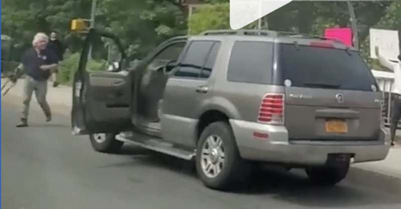 The man, spotted with a knife glove, is seen just before he got back into his car and chased down protesters.