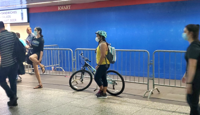 A rider waits for a train with a bike during rush hour at Penn Station — a common occurrence now. Photo: The LIRR Today