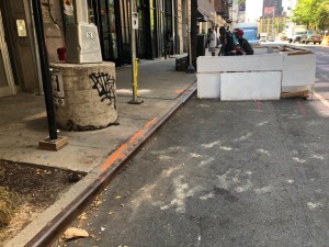 And then there was none... The city ordered the removal of the trash corral on W. 38th St. hours after being told about it.
