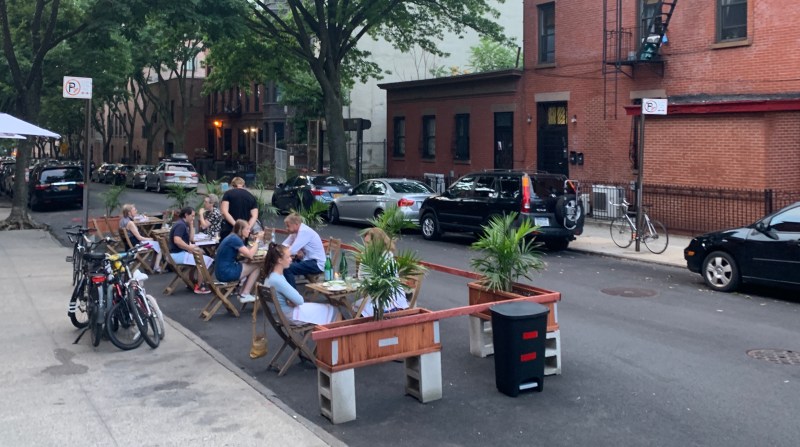 People are enjoying outdoor dining (well, they have no choice), so Mayor de Blasio will make it a permanent summer fixture. File photo: Gersh Kuntzman
