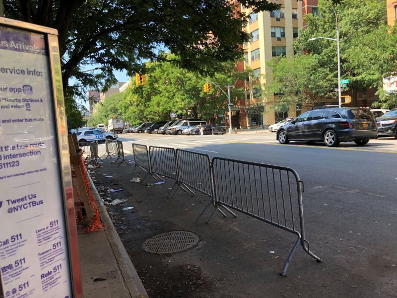 Finally! There's not a cop car in sight at the M10 bus stop on Frederick Douglass Boulevard in Harlem. Photo: Adam Light