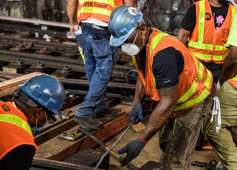 MTA workers replace switches on the Lexington Avenue 4-5-6 line. Photo: MTA
