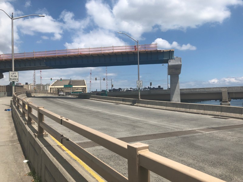 A portion of the new $48 million ramp under construction from the RFK (Triborough) Bridge to the northbound Harlem River Drive soars over the Williis Avenue Bridge. When completed, the project will sever one of the two sidewalks on the RFK Bridge's Manhattan span. Photo: Adam Light