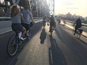 You'd look sweet, upon the seat, of a bicycle built for two as you cross the Williamsburg Bridge. Photo: Dave Colon