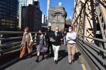 Pols, including State Senator Mike Gianaris (far right), Manhattan Borough President Gale Brewer (far left) and Jessica Ramos (next to Brewer) joined Council Members Jimmy Van Bramer and Ben Kallos, and DOT officials, on the Queensboro Bridge on Monday. Photo: Office of Mike Gianaris