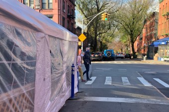 Pedestrians are endangered by dining areas that are not transparent. Photo: Gersh Kuntzman