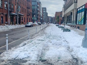 Everything you need to know about this winter storm is in this picture from the West Street bike lane on Friday. The roadway (for cars) is completely clear. The roadway (for bikes) is untouched. Photo: Elizabeth Adams