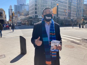 Mayoral candidate Andrew Yang with the backdrop of the Fulton Street busway behind him. Photo: Julianne Cuba