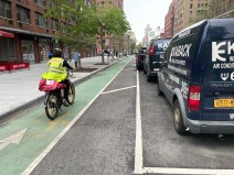 An e-bike rider in the Amsterdam Avenue bike lane near W. 78th Street. File photo: Lisa Orman