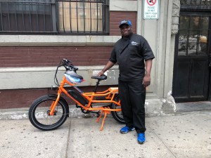 Frank Walrond with his new Rad Power bike. Photo: Fiifi Frimpong