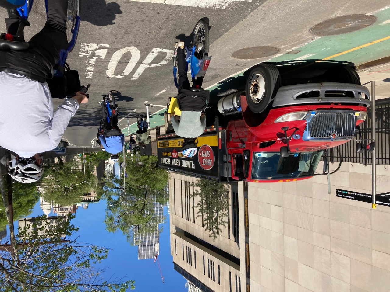 The mayor rides the wrong way towards City Hall because of a truck blocking the bike lane. Photo: Julianne Cuba