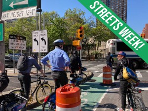 There's Mayor de Blasio taking a Citi Bike through a dangerous part of the Second Avenue bike lane. Yes, that's Streetsblog reporter Dave Colon coaching him. Photo: Julianne Cuba