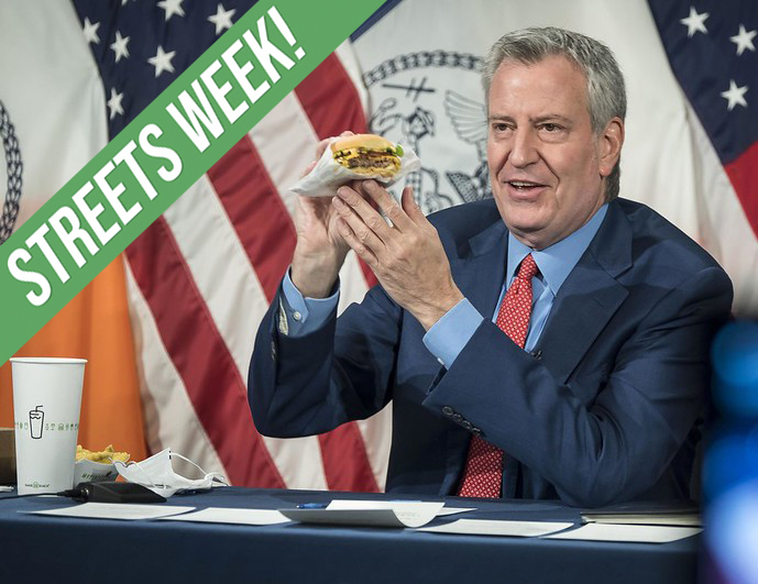Mayor de Blasio ate a Shake Shack burger as part of hyping the eatery's free fries for vaccinated people. Photo: Ed Reed/Mayoral Photography Office