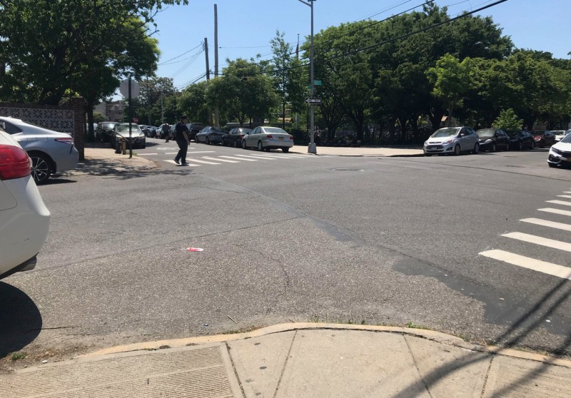 The northwest entrance to the Astoria Heights Playground (center) lacks crosswalks or a stop sign. Photo: John Surico