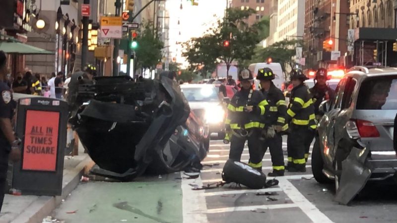 Cops on foot patrol caught up with this driver ... when he flipped the car and hit a pedestrian. Photo: Phil O'Brien/W42ST.nyc
