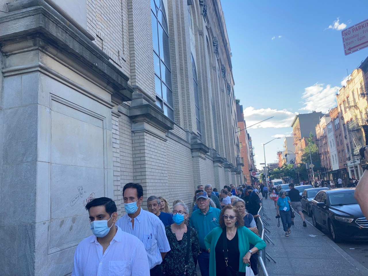 The line to get into the meeting. Photo: Julianne Cuba