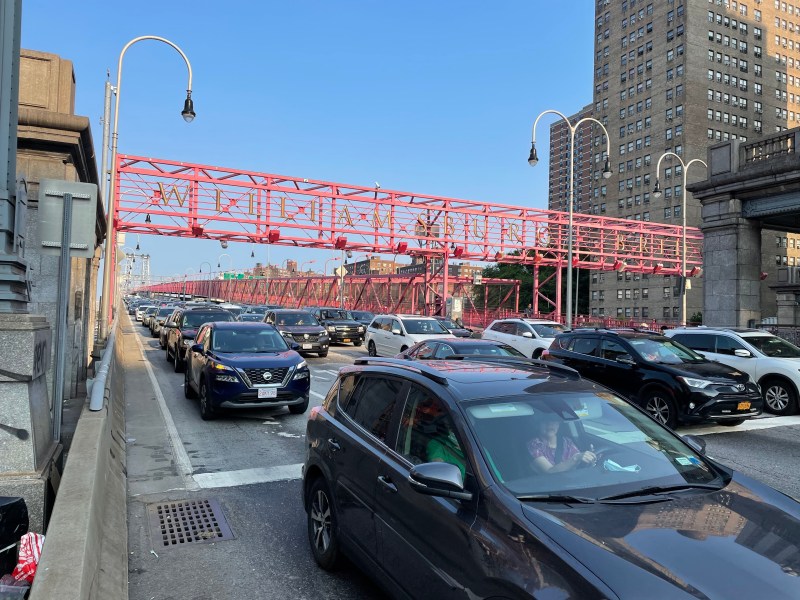 Cars clog the Williamsburg Bridge at the Delancey Street entrance.