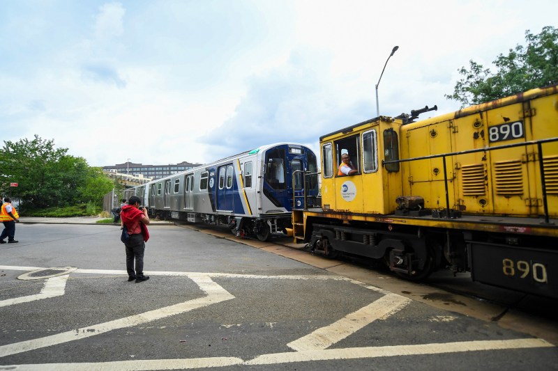 The MTA took delivery of five new R-211 subway cars — and then had to use old tracks to get them from the dock in Sunset Park into service, delighting area residents. Photo: Marc Hermann / MTA